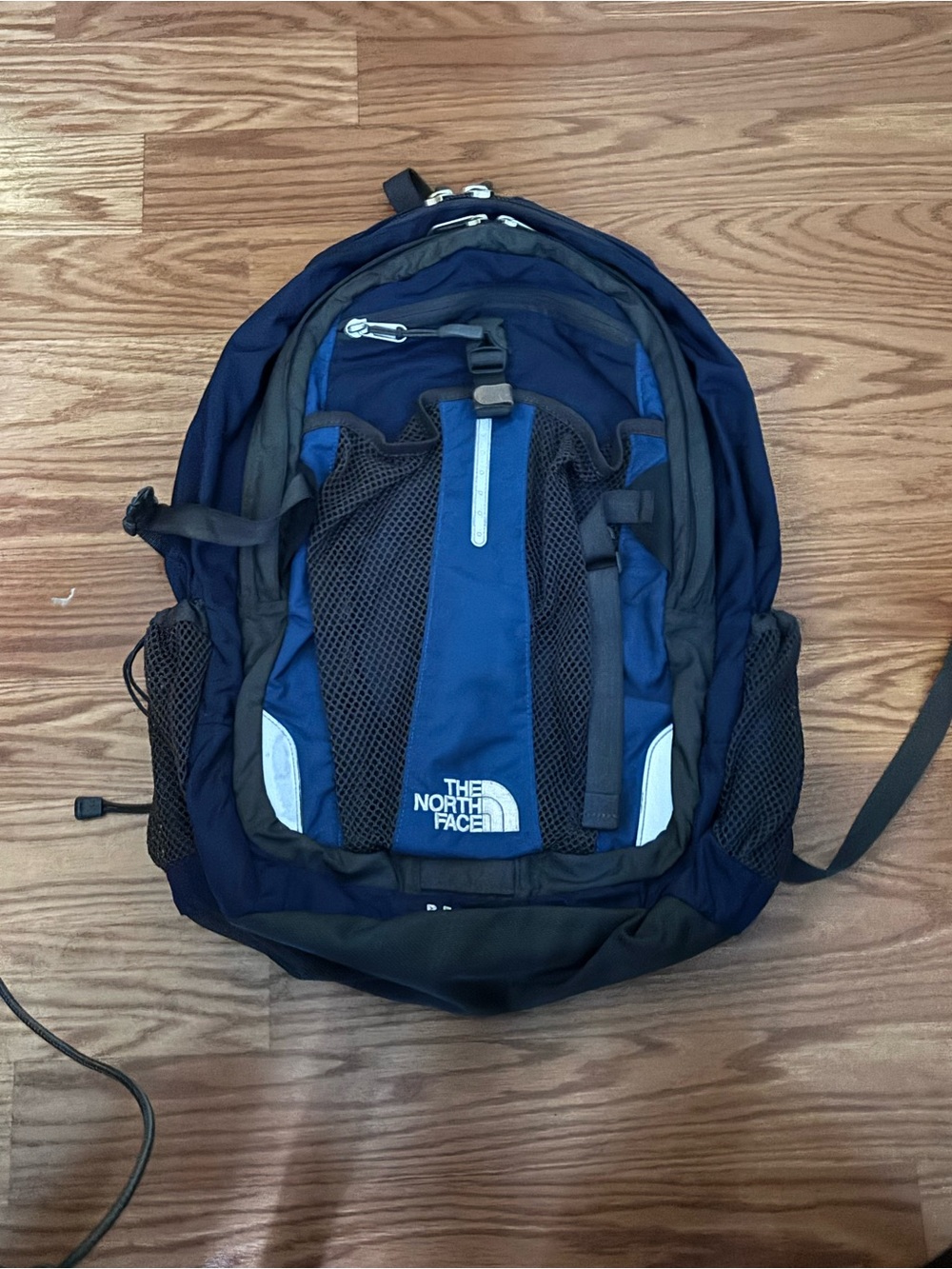 The North Face Blue and Black Men's Backpack with Reflective Accents